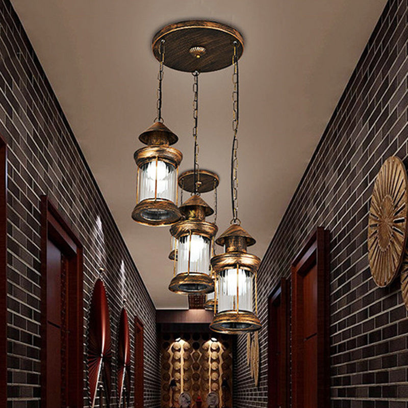 Coastal Kerosene 3-Head Pendant Lamp In Brass With Clear Ribbed Glass Shade