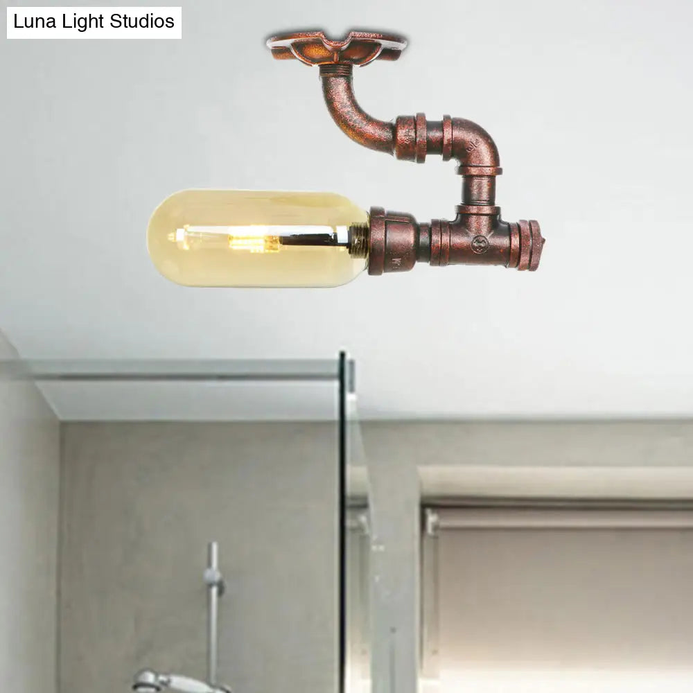 Amber Glass Semi Flush Oval Shade Light Fixture In Weathered Copper With Industrial Pipe Design For