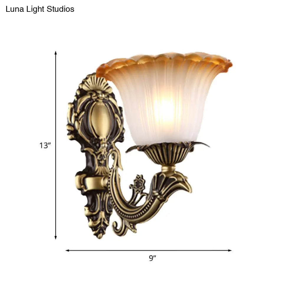 Vintage Floral Wall Sconce With Frosted Glass And Carved Brass Arm