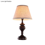 1-Light Brown Reading Lamp - Tapered Fabric Nightstand Lighting For Bedroom