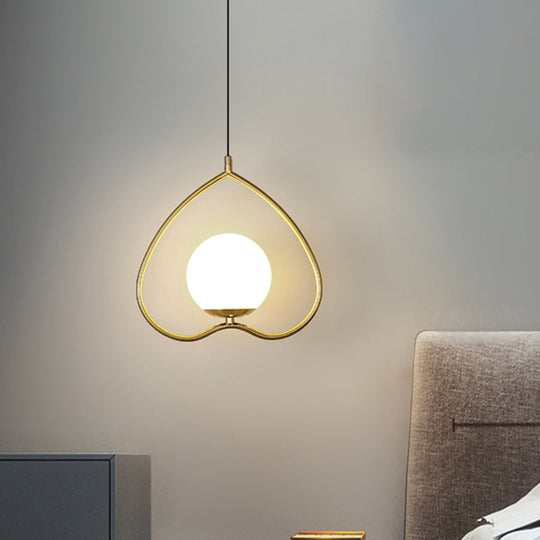 Gold Single Pendulum Light With Heart-Shaped Down Lighting And Opal Glass Shade