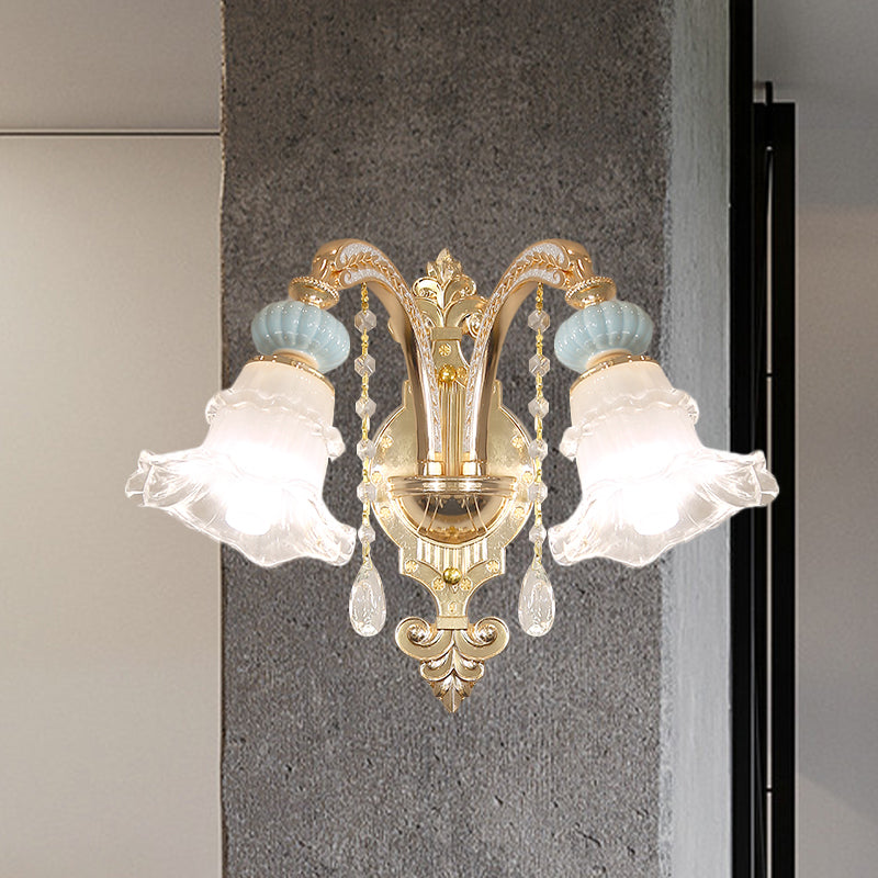 Traditional Blue Frosted Glass Wall Sconce With Ceramic Accent And Ruffle Trim