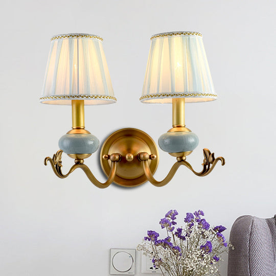 Traditional Style Brass Wall Sconce With Curved Arm Fabric Shade