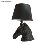 14/18 Wide Vintage 1-Light Table Lamp With Tapered Fabric Shade And Horse Head Base In Black