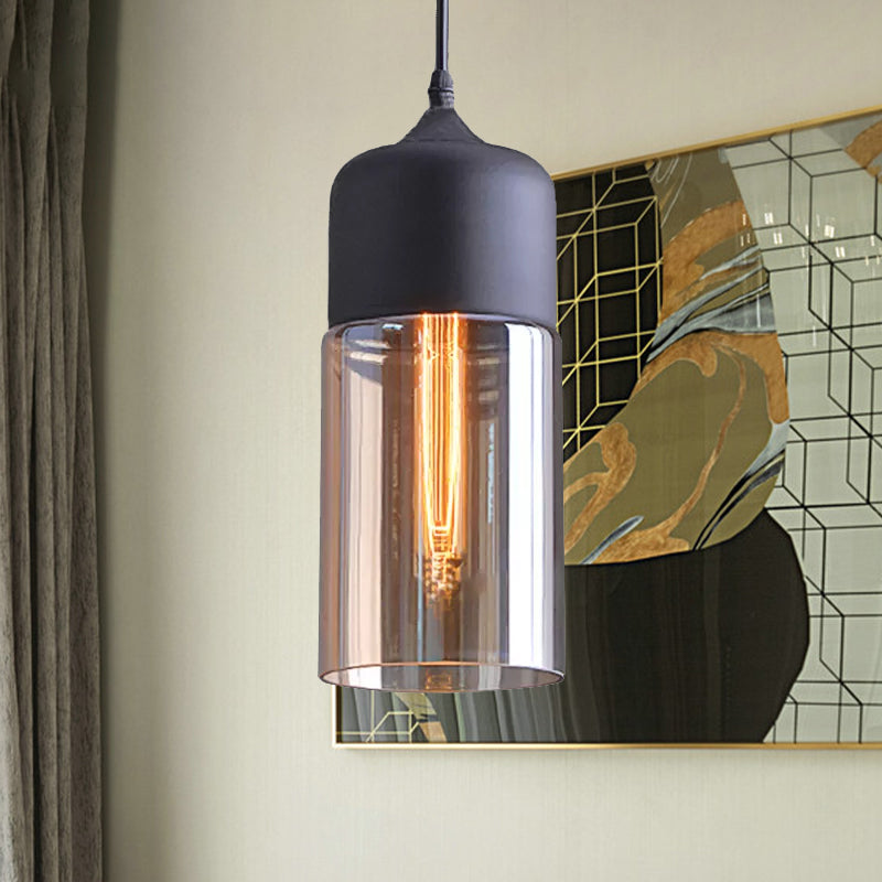 Industrial Cylinder Pendant Light With Brown Glass Shade - 1-Light Hanging Ceiling Fixture In Black
