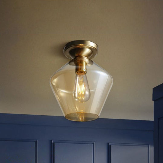 Contemporary Brass Flush Ceiling Fixture With Amber Glass Lampshade