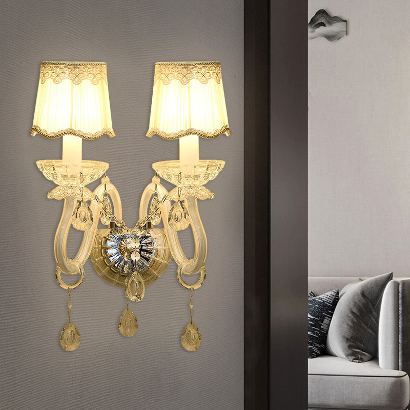 Traditional White Candle Wall Lamp With Clear Crystal Accent And Scalloped Fabric Shade