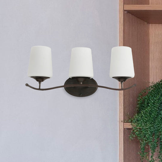 Ivory Glass Vanity Lighting With Iron Wavy Arm - Traditional Black Tapered Wall Light For Bedroom