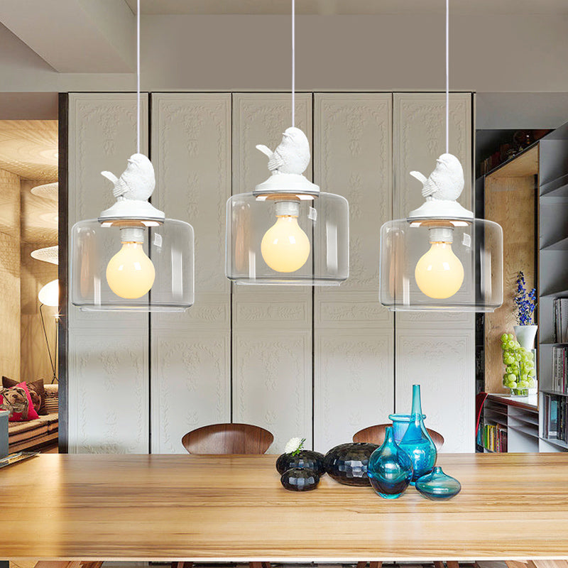 Modern Drum Shaped Dinette Pendant Lamp With Clear Glass And White Bird Top