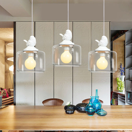 Modern Drum Shaped Dinette Pendant Lamp With Clear Glass And White Bird Top