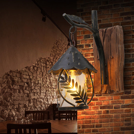 Industrial Living Room Sconce: One Bulb Wall Light With Clear Glass Cylinder Shade And Leaf Branch