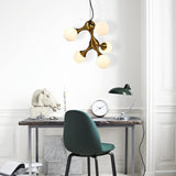 Modern Metal Starburst Chandelier With Glass Globe Shades - 5/9/15 Lights In Brass 5 /