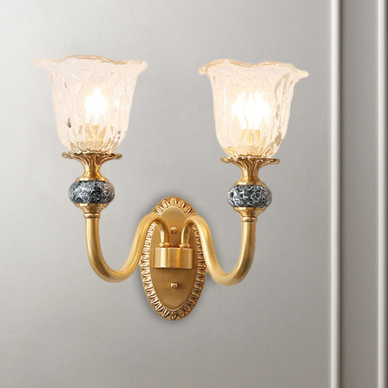 Classic Brass Floral Wall Sconce With Clear Ribbed Glass And Swooping Arm - 1/2-Head Mount Lamp
