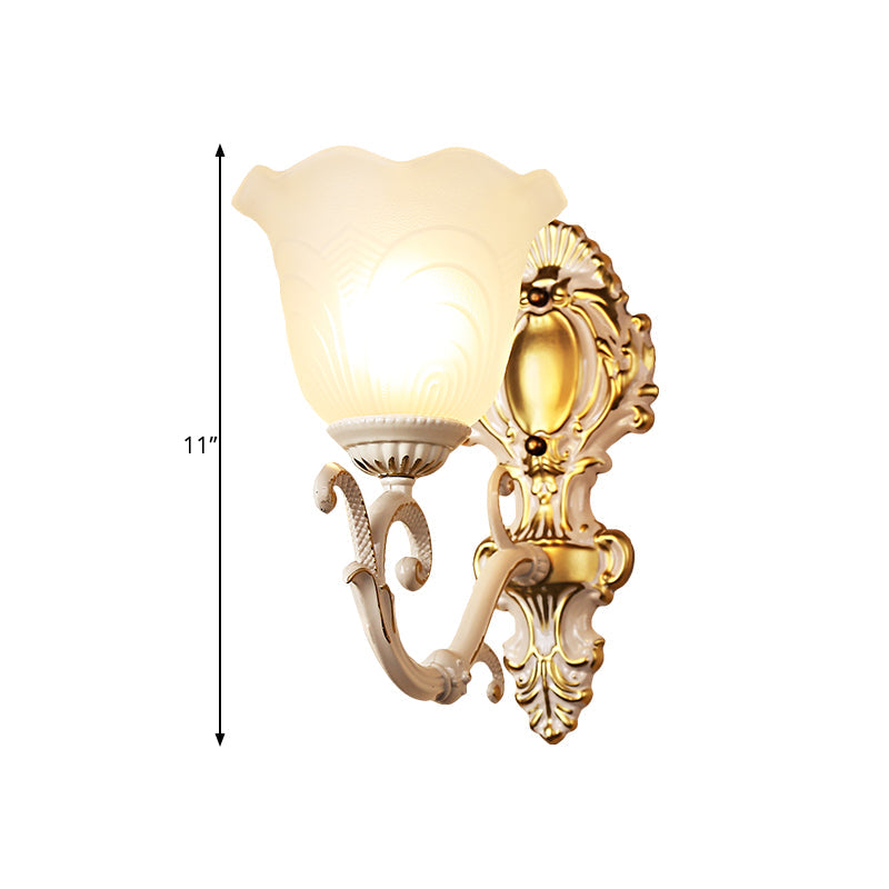 Vintage Brass/Beige Frosted Ribbed Glass Wall Sconce Lamp With Curvy Arm - 1 Light Bloom