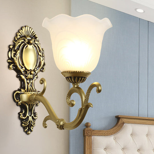 Vintage Brass/Beige Frosted Ribbed Glass Wall Sconce Lamp With Curvy Arm - 1 Light Bloom Brass