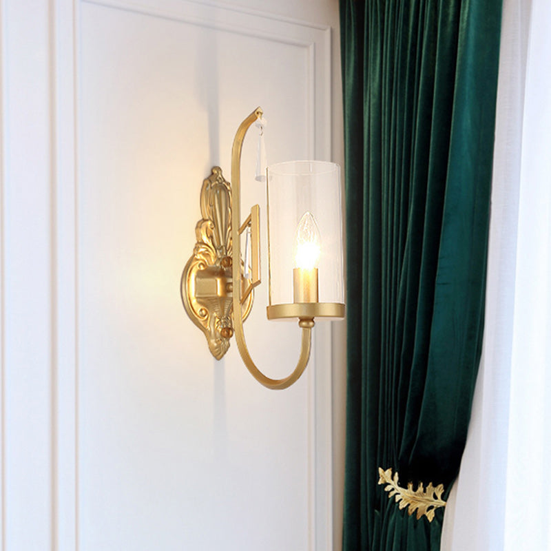 Country Clear Glass Wall Sconce With Curved Arm - Gold Cylinder Surface Lighting For Living Room