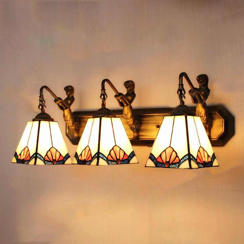 Tiffany White Glass Trapezoid Wall Mount Light With Mermaid Decoration - 3 Lights Brass Vanity
