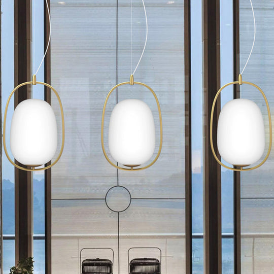 Postmodern Gold Cocoon Pendant Lamp With Frame And Glass Shade – Single Ceiling Hang Light