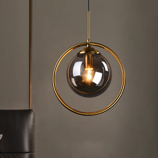 Postmodern Glass Pendant Light With Globe Down Lighting And Brass Ring For Bedroom
