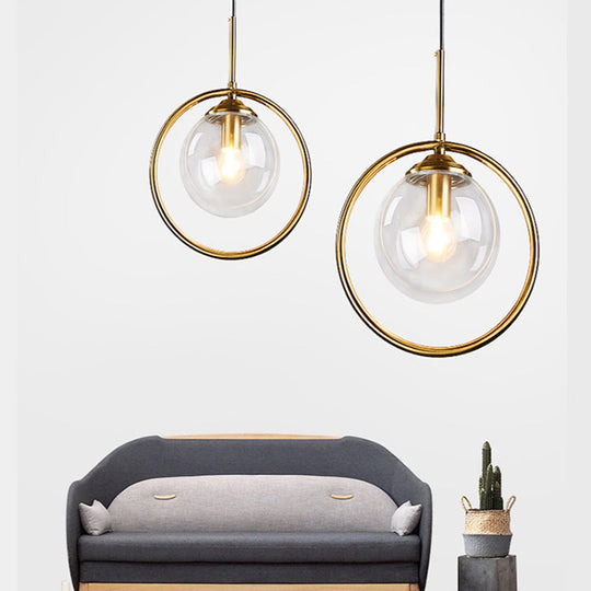 Postmodern Glass Pendant Light With Globe Down Lighting And Brass Ring For Bedroom