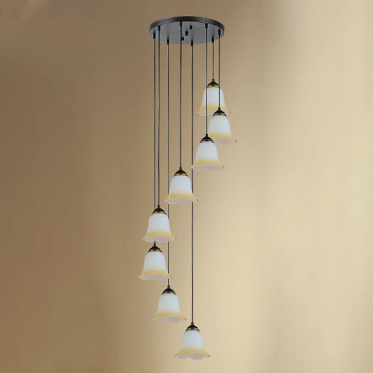 Minimalist Black Flower Stairs Pendant Light With Frosted Glass And Round Canopy