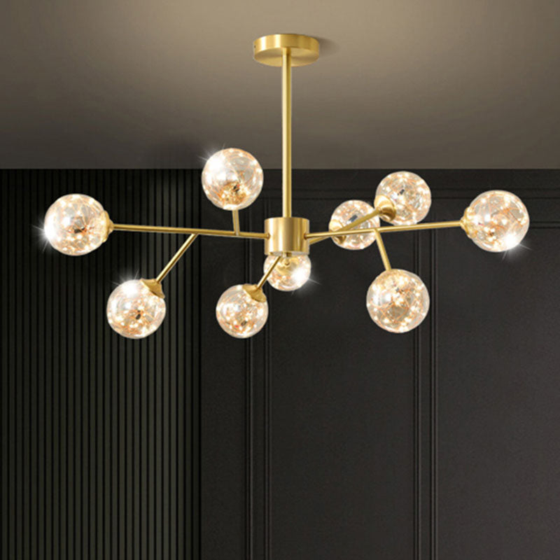 Minimalist Metal Led Chandelier In Gold With Starburst Pendulum Design And Bubble Shade