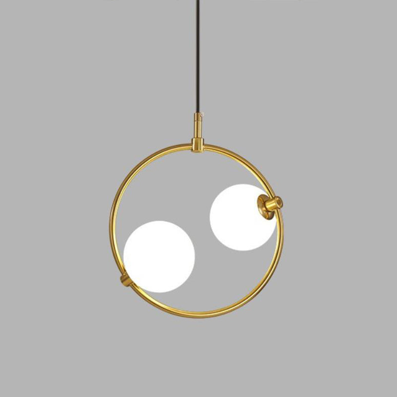 Minimalist Milky Glass Orb Pendant Light With Gold Pendulum And Metal Frame