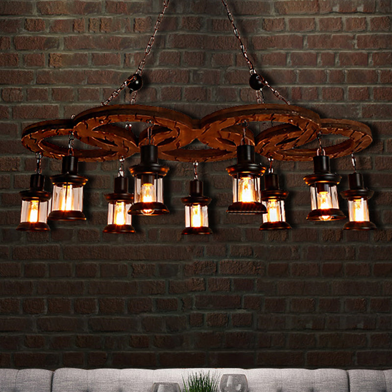 Coastal Lantern Chandelier: Clear Glass Lighting Pendant With Black Finish And Wooden Shelf