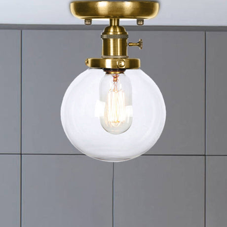 Semi Flush Bronze Globe Round Ceiling Light With Industrial Clear/Amber Glass - 1-Light Fixture For