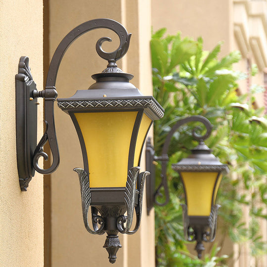Traditional Coffee Square Bell Outdoor Wall Light Fixture With Tan Glass Mount - 1 Head