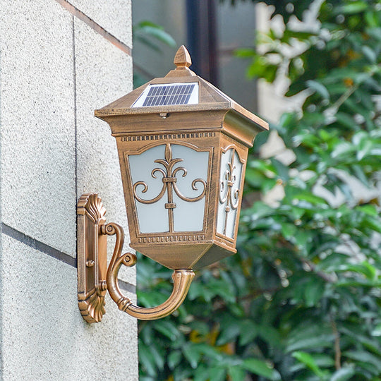 Vintage Courtyard Solar Wall Light - House Shaped Metal Lamp With Frost Glass Shade