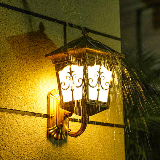 Vintage Courtyard Solar Wall Light - House Shaped Metal Lamp With Frost Glass Shade