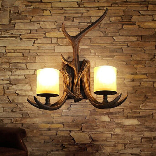 Rustic Frost Glass Wall Lamp With Brown Cylinder 2 Bulbs - Decorative Antler Accent For Living Room