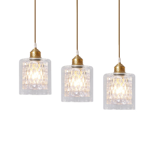 Modern Brass Cylinder Pendant Light With Prismatic Glass Shade - 3 Lights Linear/Round Canopy