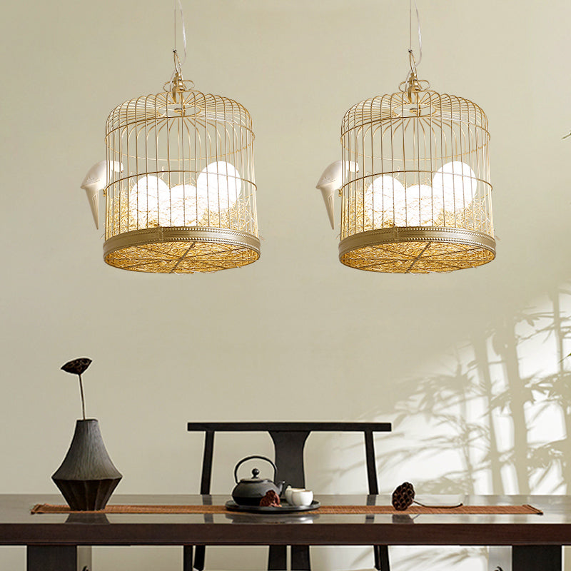 Rustic Matte White Glass Egg Shaped Chandelier With Bird And Birdcage - 3 Light Hanging Fixture