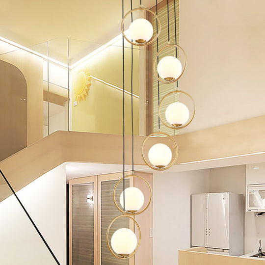 Contemporary Globe Multi Ceiling Lamp With Cream Glass And Black Halo Ring: Staircase Suspension
