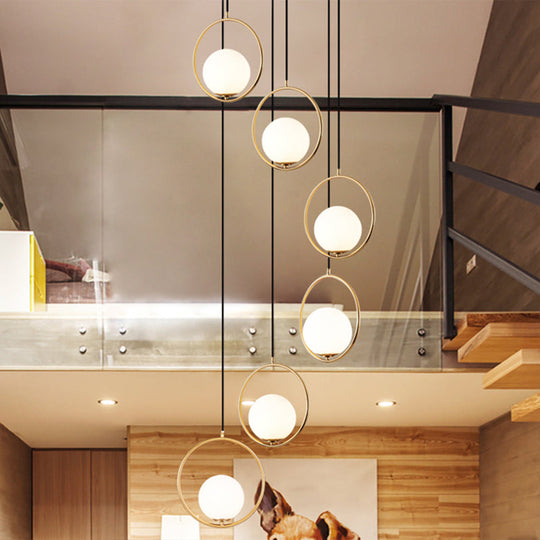 Contemporary Globe Multi Ceiling Lamp With Cream Glass And Black Halo Ring: Staircase Suspension