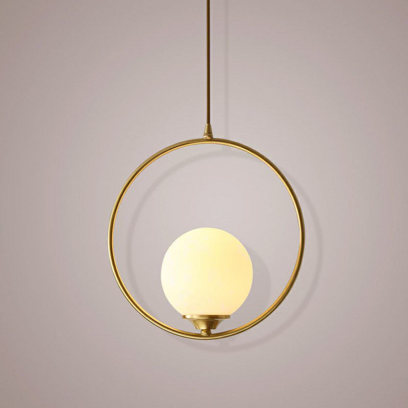 Minimalist Antique Gold Ball Ceiling Lamp With Cream Glass Shade And Ring Decoration