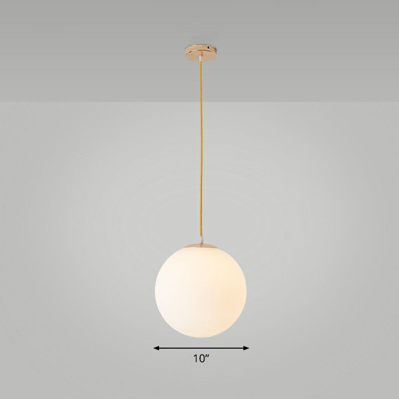 Sleek White Glass Pendant Light For Minimalist Table Settings / 10’
