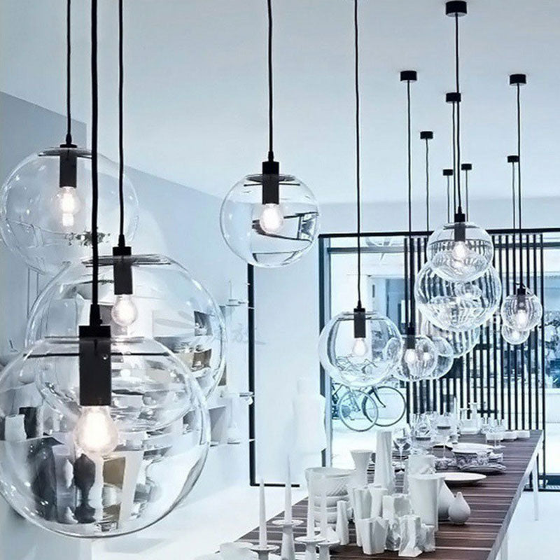 Minimalistic 1-Light Black Pendant Light Fixture - Clear Glass Globe Design For Restaurants
