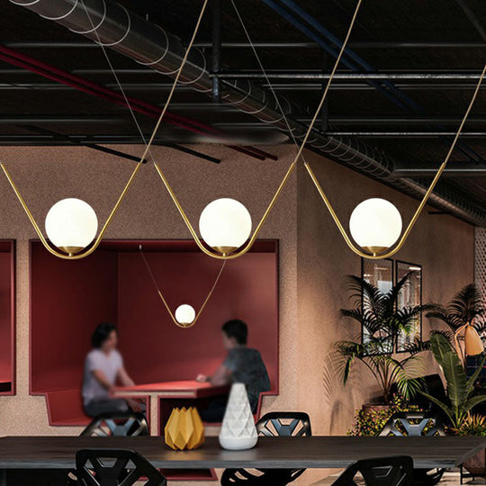 Suspended Gold Pendant Light With White Glass Shade - Minimalist V-Design