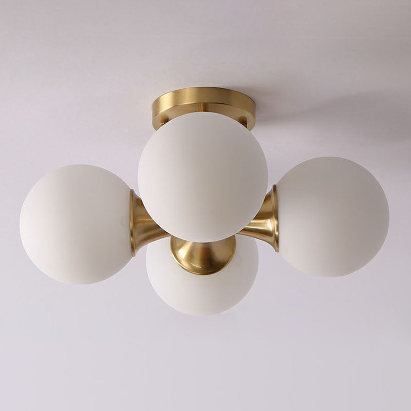Postmodern Gold Finish Flush Mount Ceiling Light With White Glass Ball