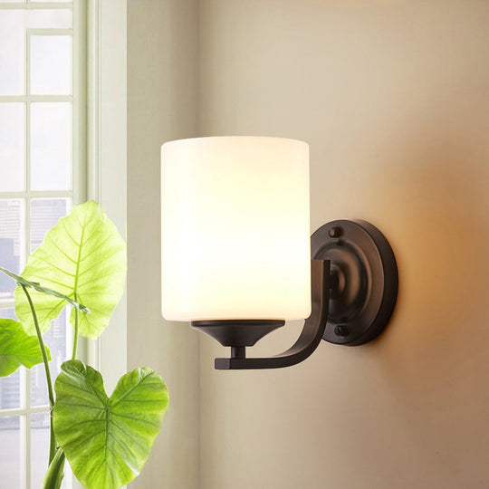 Sleek Black Wall Sconce With White Glass Cylinder - Single-Bulb Simplicity Fixture