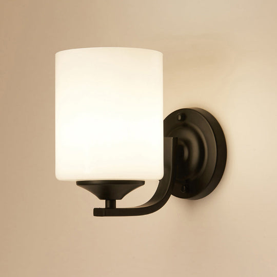 Sleek Black Wall Sconce With White Glass Cylinder - Single-Bulb Simplicity Fixture