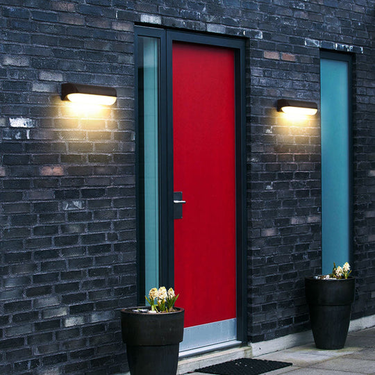 Minimalist Black Acrylic Led Wall Sconce For Yard - Capsule Shape