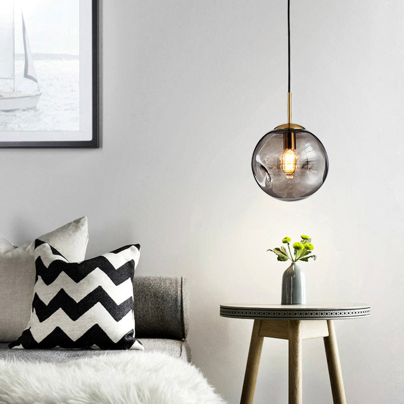 Postmodern Brass Pendant Lamp With Dimpled Glass Globe For Bedroom