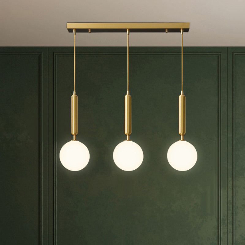 Postmodern Brass Pendant With Ball Glass Shades - Stylish 3-Light Ceiling Fixture For Dining Rooms