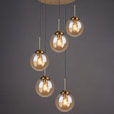 Brass Finish Cluster Ball Pendant - Post-Modern Glass Suspended Lighting Fixture With 5 Bulbs Amber