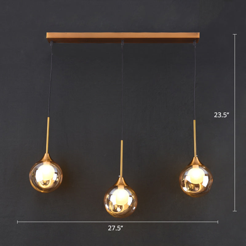 Minimalist Glass Pendant Light With 3-Head Design For Dining Room And Multiple Hanging Options Amber