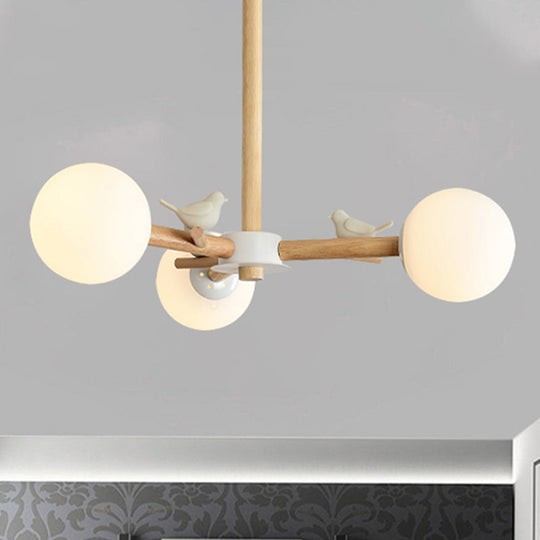 Japanese-Inspired Bedroom Chandelier With Orb Shade Birds Wood And Glass In White